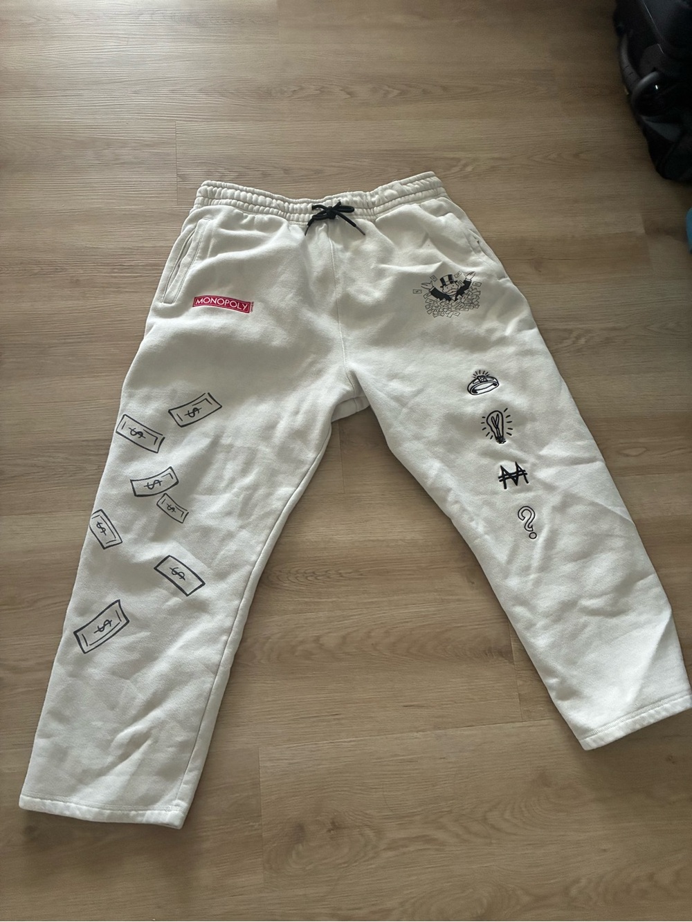 PALACE Cream Graphic Sweatpants with Money Print